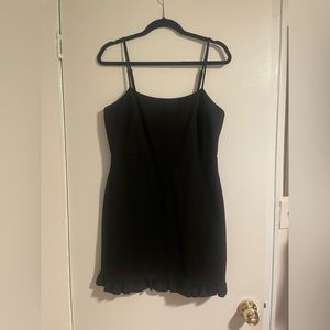 Black Lulu’s bodycon mini dress with fringe detail. Size XL